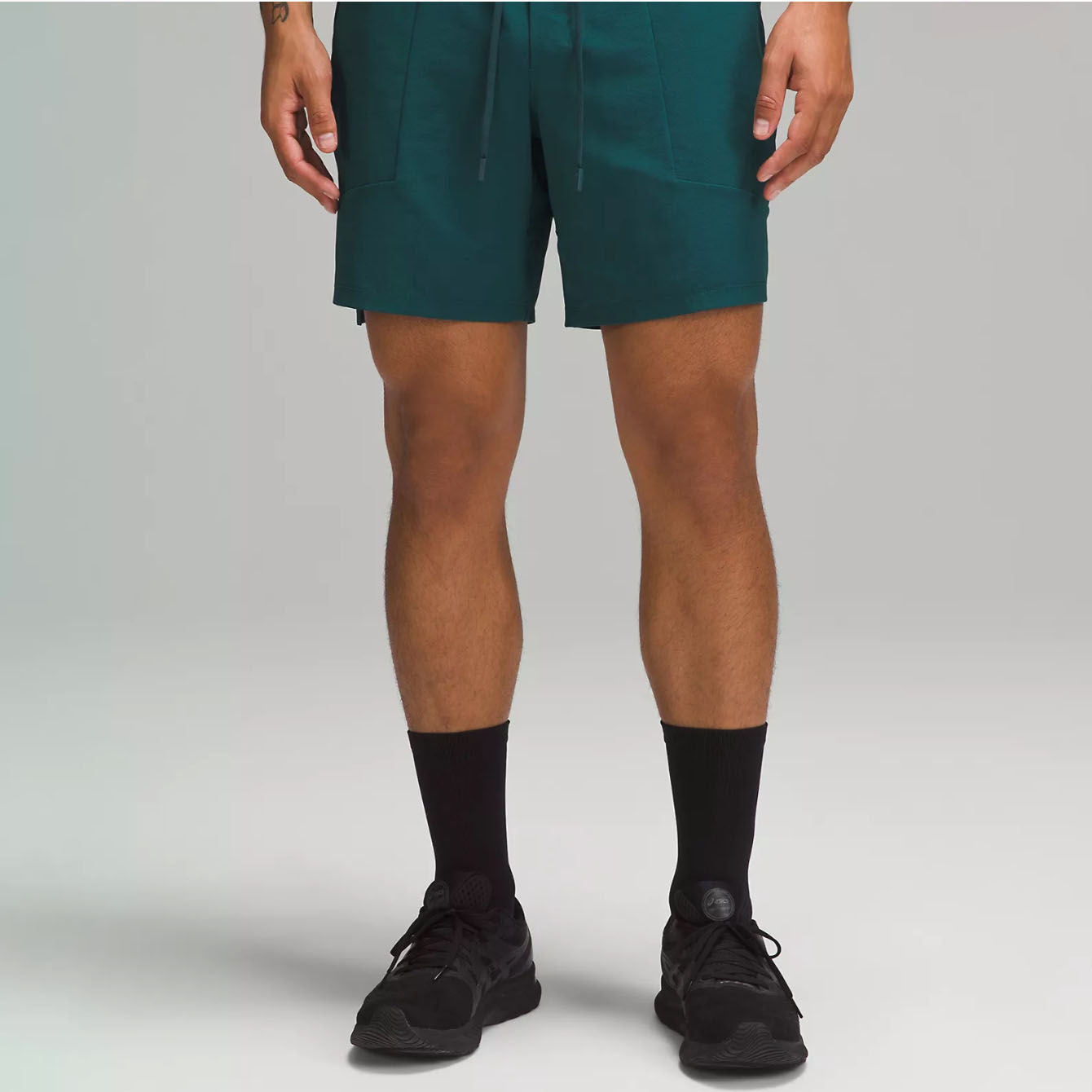 Men wearing dark green gym shorts
