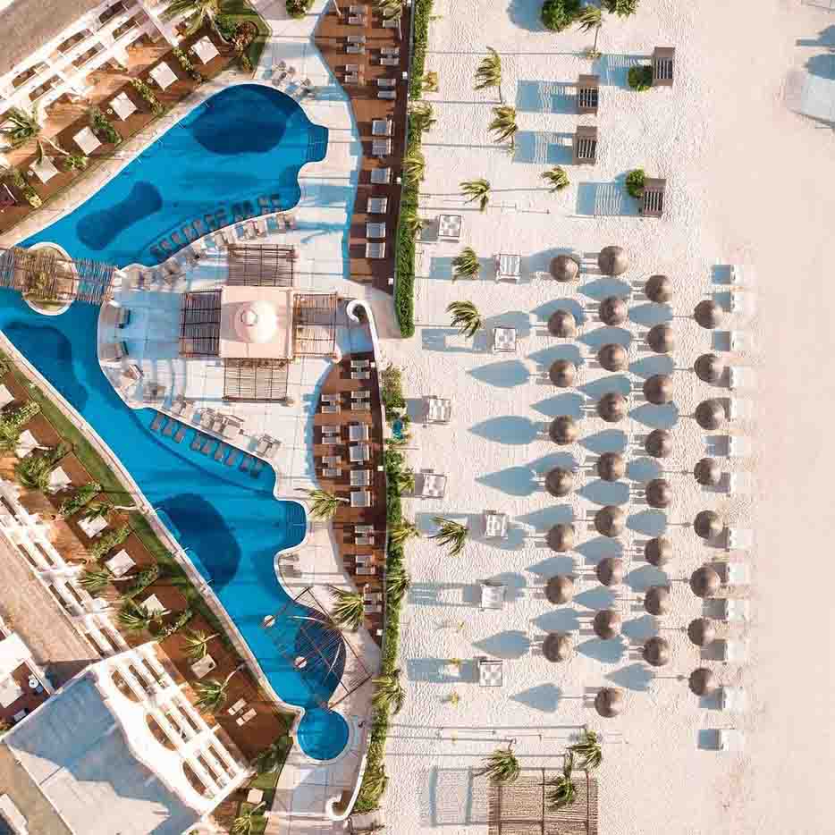 Top view of resort pool and beach