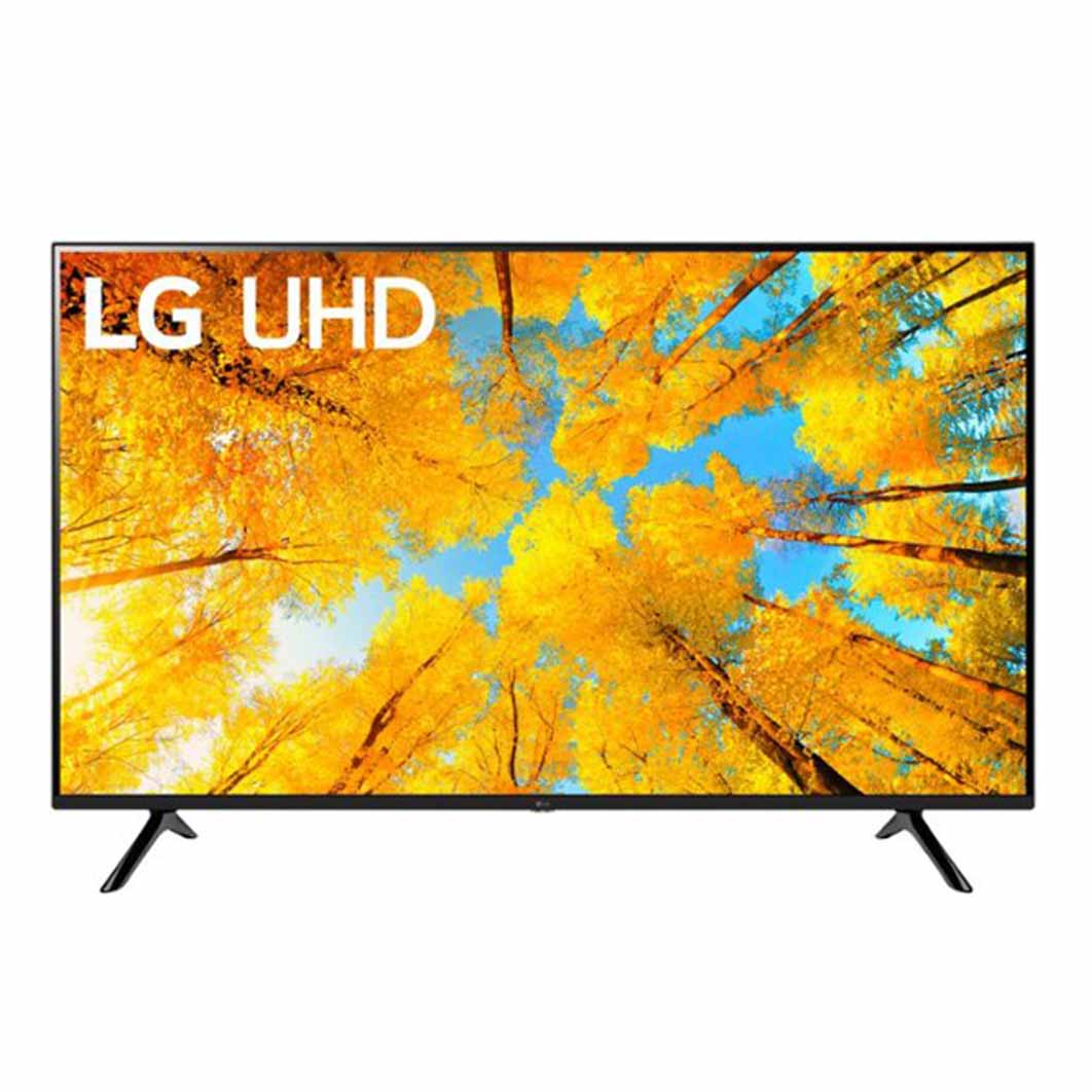 large LG UHD tv on stand with autumn tree image displayed