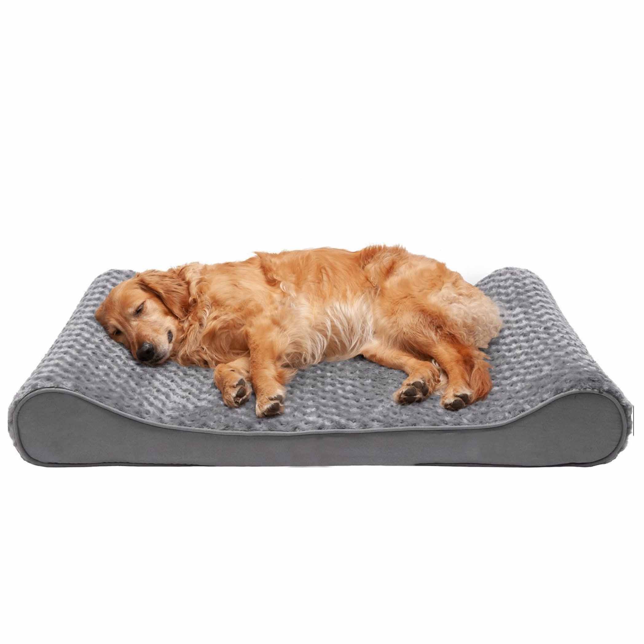 Dog lying on grey rectangle dog bed