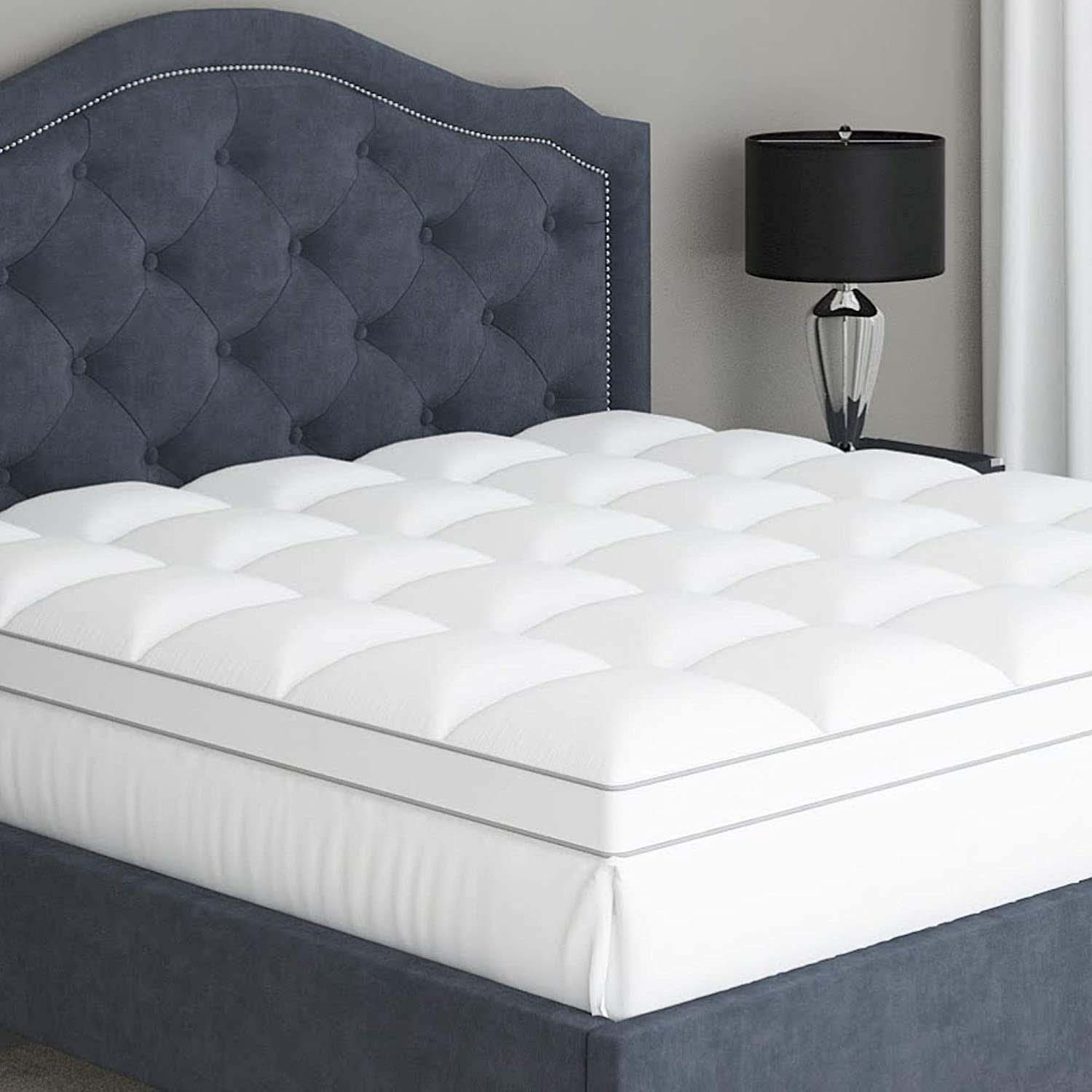 sleep manta mattress topper on bed