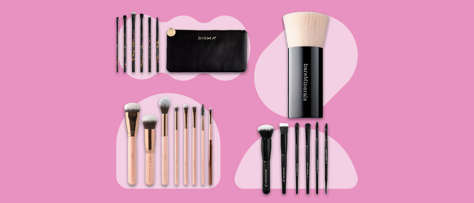 makeup brushes from Macy's, Sephora and Target on pink background