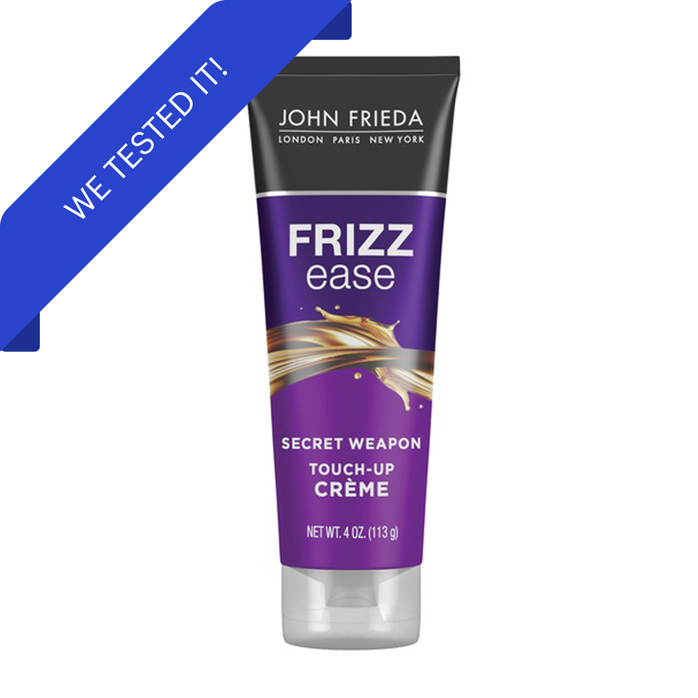 purple and black tube of frizz ease cream with we tested it badge